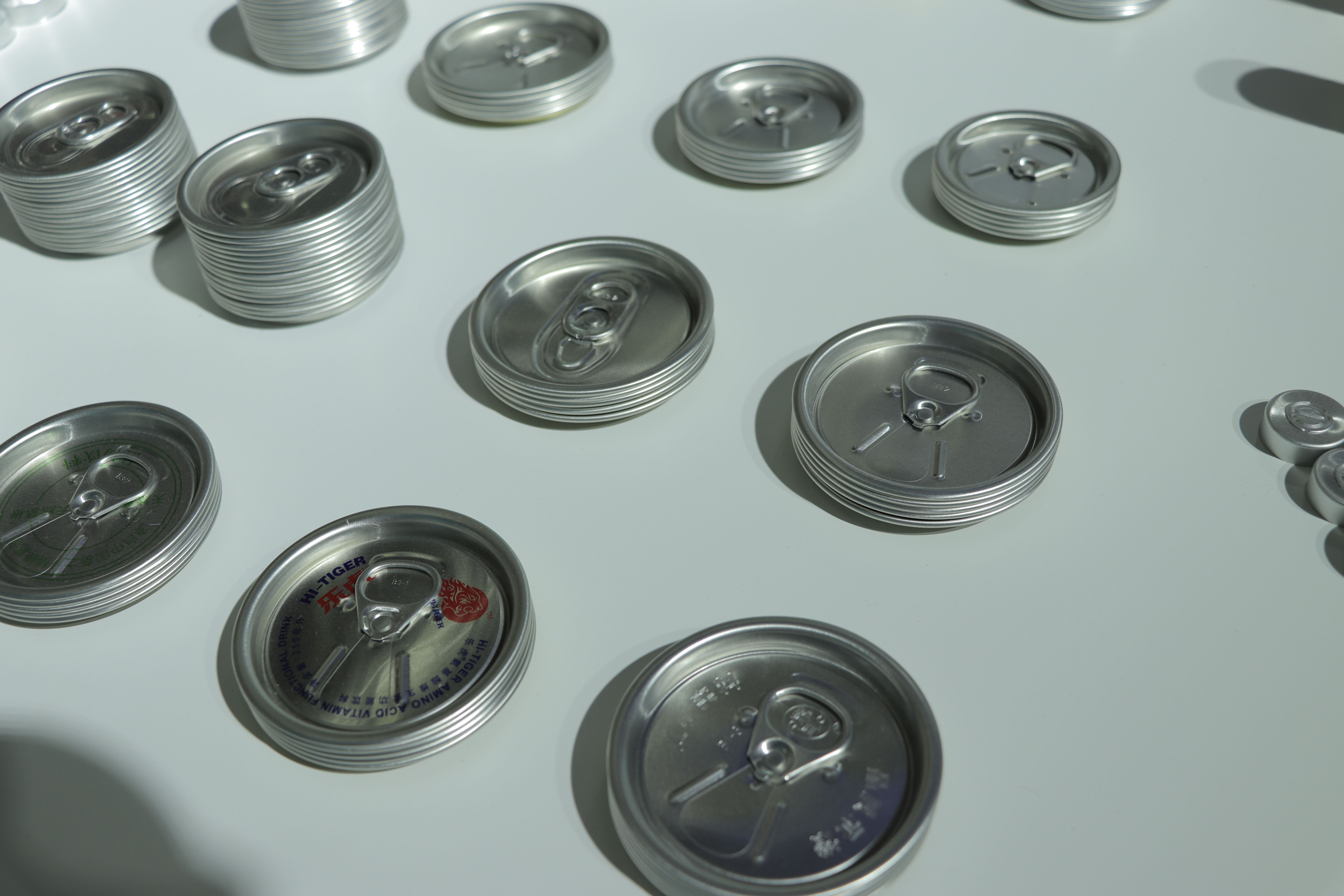 Beverage can end, can tap, cap stock